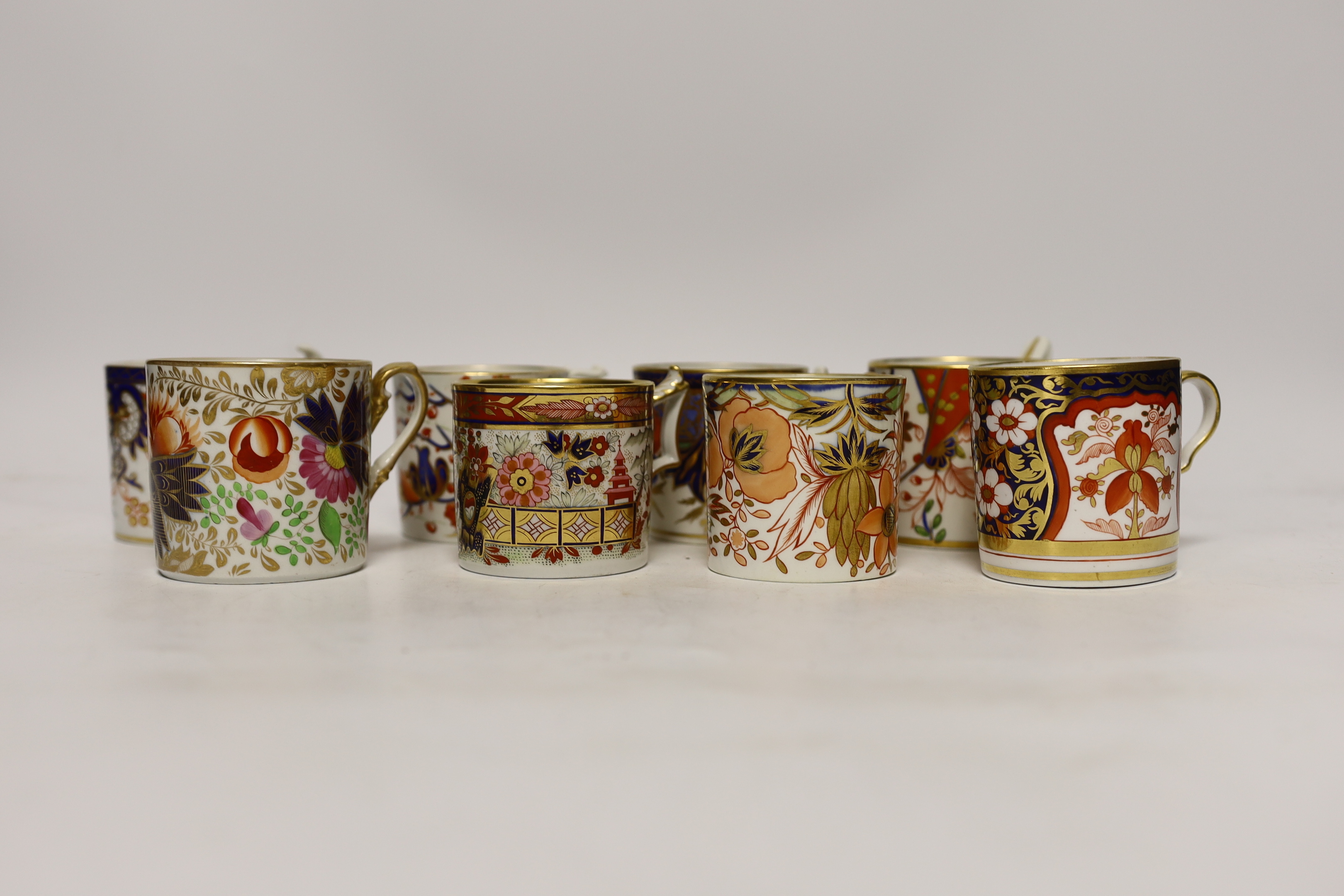 Twelve 1800-1820 English Imari patterned coffee cans